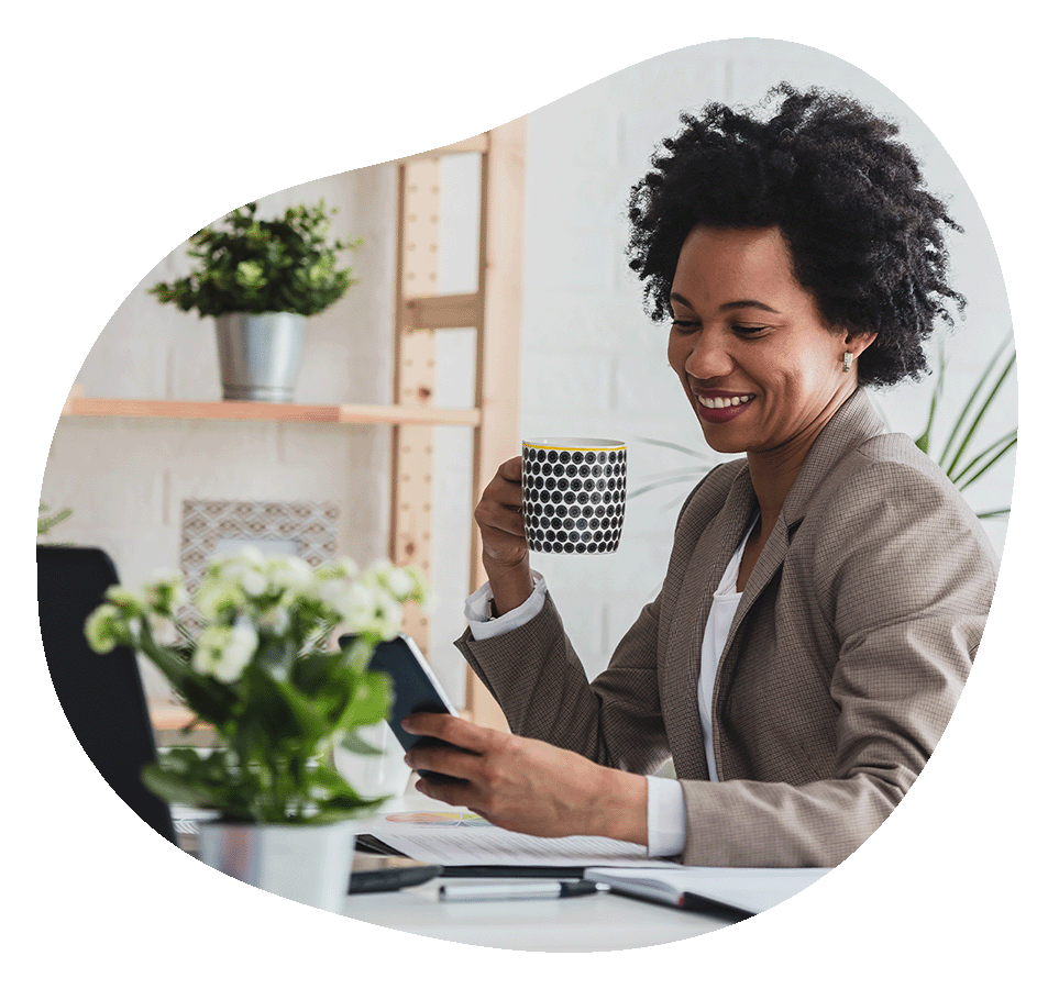 Woman smiling looking at phone